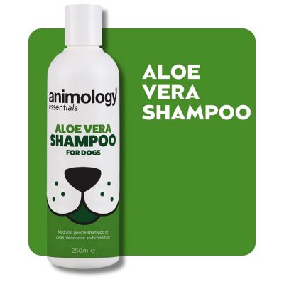 Bottle of Aloe Vera Dog Shampoo on a green background