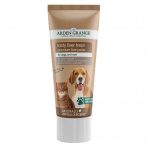 A single tube of Arden Grange Tasty Liver Treat Premium Liver Paste for dogs and cats, standing upright against a plain white background. The beige and brown packaging features illustrations of a domestic tabby cat and a happy Beagle dog panting. Text highlights it as a grain-free, naturally hypoallergenic recipe perfect for training, grooming, rewarding, and administering medication. High-value reward paste available from MAH Pet Supplies in Clowne
