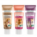A side-by-side product lineup of the three variations of Arden Grange Tasty Treat premium pastes against a solid white background. From left to right: the beige Liver paste tube featuring a brown tabby cat and a Beagle; the pink Salmon paste tube featuring a ginger tabby cat and a Rough Collie; and the purple Turkey paste tube featuring a long-haired grey Maine Coon cat and a Shiba Inu. Showcasing the complete grain-free, hypoallergenic reward paste flavour range available for fast local delivery from MAH Pet Supplies