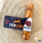 Collagen Roll Dog Treat on a log plinth