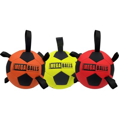 Group product shot of three Hemmo Mega Ball Pick-Me-Up interactive dog toys in 3 matte finish colours, orange, bright yellow, and vibrant red. Each durable, football-style dog toy features classic black pentagon panels, multiple black nylon grab loops for easy fetching and tugging, and the bold text "HEMMO MEGA BALLS" printed across the front. Available for nationwide UK delivery and free local delivery or collection from MAH Pet Supplies pop up pet shop in Clowne.