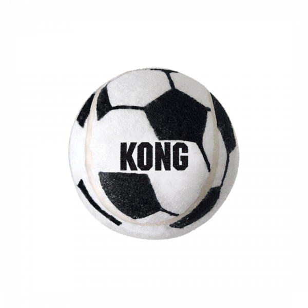 A studio product shot of a large KONG Sport Soccer Ball against a solid black background. The ball features a classic black and white pentagon soccer pattern with a textured, non-abrasive felt surface that is gentle on a dog's teeth and gums. The "KONG" brand name is printed prominently in bold black lettering across the centre.