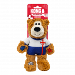 The KONG Wild Knots England Bear in its retail packaging. The red header card features the KONG logo, a football icon, and the text "WILD KNOTS BEAR - LIMITED EDITION." The packaging includes multi-language labels for "Squeaks" and "Limited Edition," making it a perfect commemorative gift for football-loving households. The bear is securely attached to the card, ready for display.