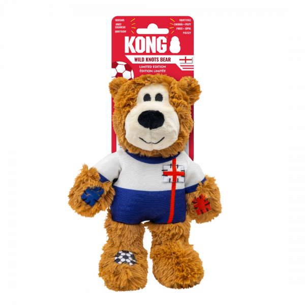 KONG Wild Knots World Cup England Bear on card 1080px The KONG Wild Knots England Bear in its retail packaging. The red header card features the KONG logo, a football icon, and the text "WILD KNOTS BEAR - LIMITED EDITION." The packaging includes multi-language labels for "Squeaks" and "Limited Edition," making it a perfect commemorative gift for football-loving households. The bear is securely attached to the card, ready for display.
