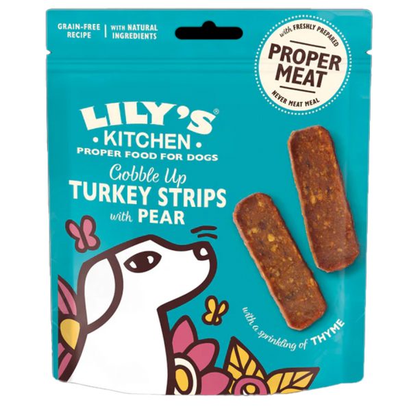 A professional product image of a teal 70g resealable pouch of Lily's Kitchen "Gobble Up Turkey Strips with Pear" dog treats. The packaging features the brand's signature illustrated style, showing a white dog with pink and yellow flowers and butterflies. Two rectangular, chewy meat strips are displayed outside the bag, showing a coarse, natural texture. Key product callouts on the bag include "Grain-Free Recipe," "With Natural Ingredients," and a "Proper Meat - Never Meat Meal" seal. Small text at the bottom notes the addition of a "sprinkling of thyme