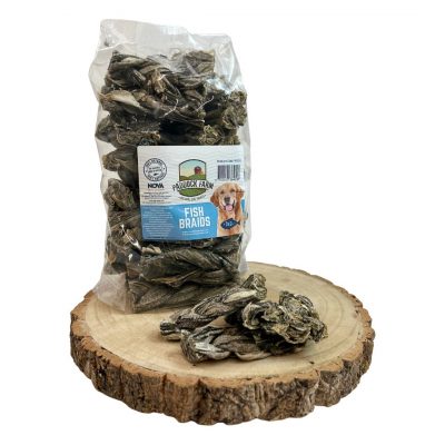Bag of Paddock Farm Fish Skin Braid Natural Dog Treats from Nova Dog Chews on a display log with some loose treats in front