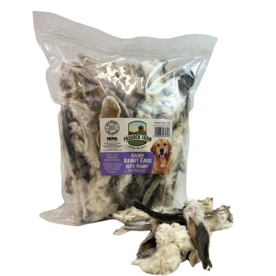 1kg Bag of Paddock Farm Hairy Rabbit Ears Natural Dog treats with a handful of loose ears in front