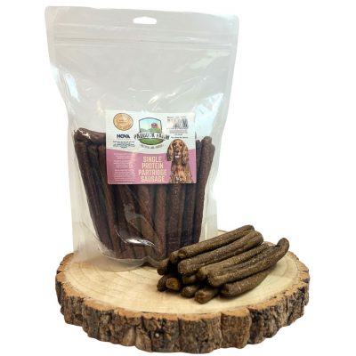 Pack of Partridge dog treat sausages, with a stack displayed out of packet