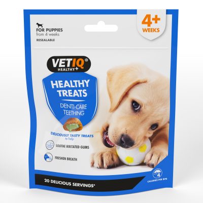 Pack of VetIQ Puppy Teething Treats with cute Golden Lab puppy chewing a ball