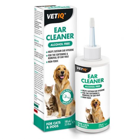 Bottle of Ear Cleaner with application nozzle next to its box - both with a cat and dog on the front