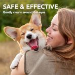 Close-up lifestyle photograph of a smiling woman hugging a happy, vocal Corgi dog outdoors, featuring the text "SAFE & EFFECTIVE - Gently cleans around the eyes." Ideal for showing gentle eye care and daily grooming routines for dogs. Available from MAH Pet Supplies for free local delivery in Clowne and surrounding S43, S44, S21, S80, and NG20 postal areas