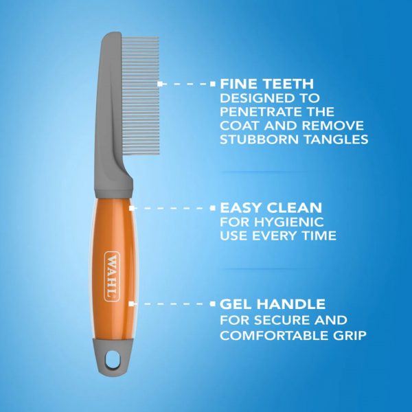 WAHL Grooming Comb F&B 1080px Marketing infographic of the WAHL dog grooming comb positioned vertically against a clean, vibrant blue background. White dotted indicator lines point out the product's key selling points. The top text highlights "FINE TEETH DESIGNED TO PENETRATE THE COAT AND REMOVE STUBBORN TANGLES". The middle text notes "EASY CLEAN FOR HYGIENIC USE EVERY TIME". The bottom text points to the "GEL HANDLE FOR SECURE AND COMFORTABLE GRIP"