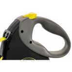 Close-up of the grey soft grip handle and neon yellow brake button on the Flexi Giant retractable lead