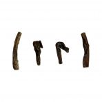 Four individual pieces of dark brown, textured Paddock Farm Camel Tripe dog treats by Nova Dog Chews, arranged in a horizontal row against a solid white background. The shot highlights the natural variations in shape, thickness, and fibrous texture of these 100% natural, single-protein dog chews